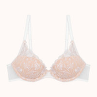 nude bra with lace details on a white background