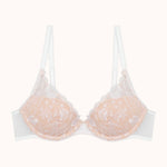 nude bra with lace details on a white background