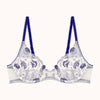 white bra with blue floral patterns and blue straps on a white background
