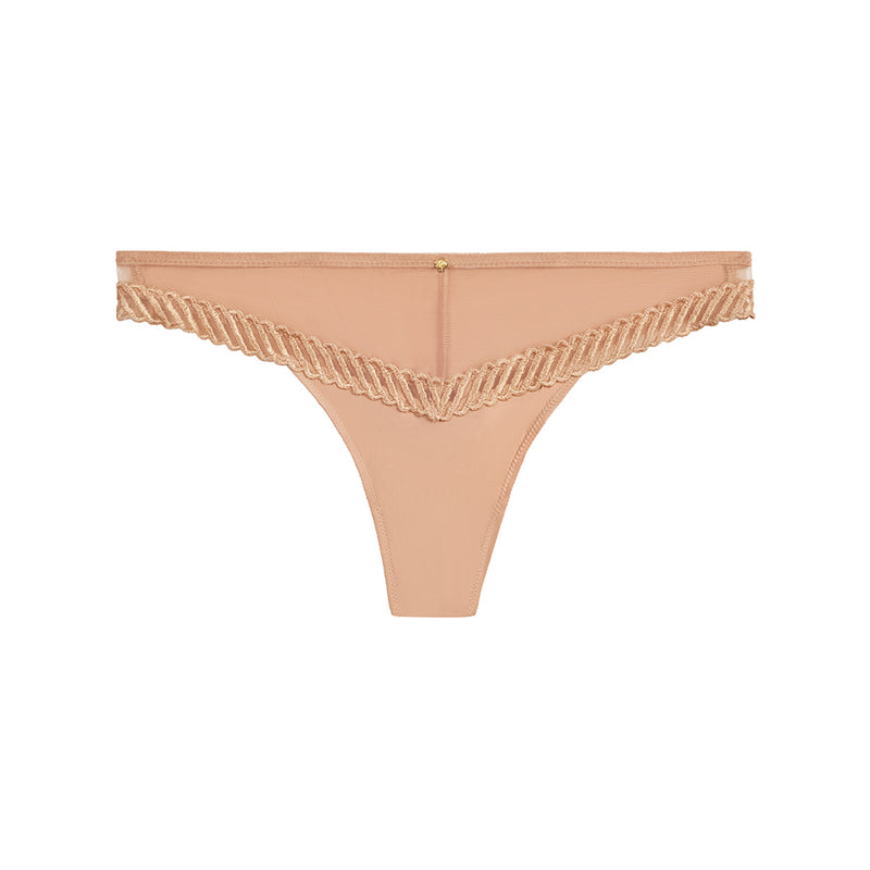 beige thong with ruffled edge on a white background