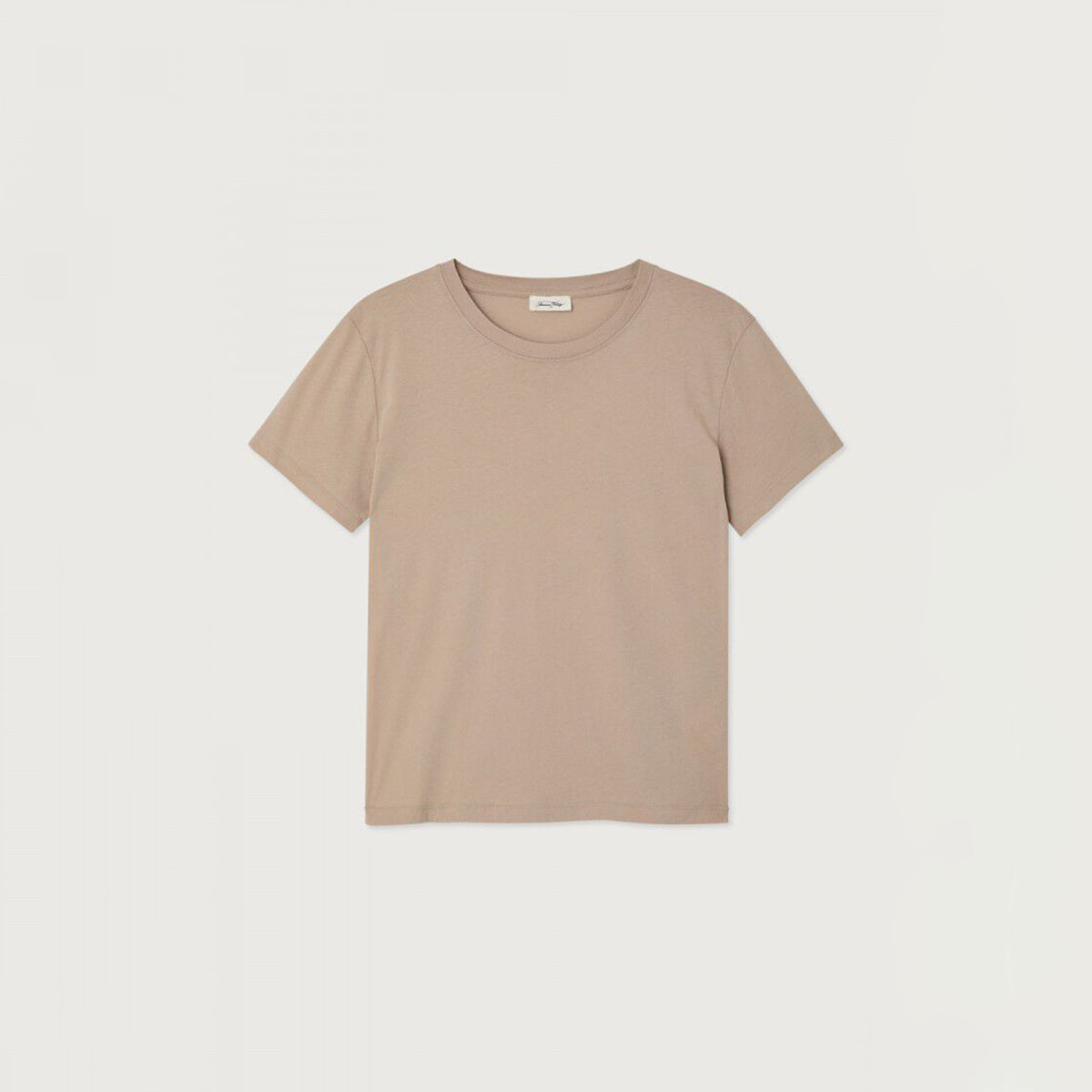 A short-sleeve crewneck t-shirt in a solid light beige color, laid flat against a clean off-white background.