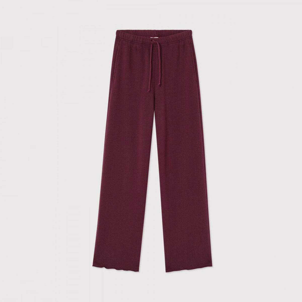 A pair of wide-leg lounge pants in a deep burgundy color, featuring an elastic waistband and a matching drawstring, displayed flat against a light off-white background.