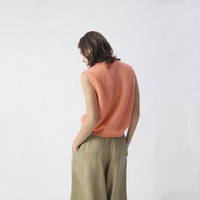 american vintage salmon melange sleeveless jumper on model on back