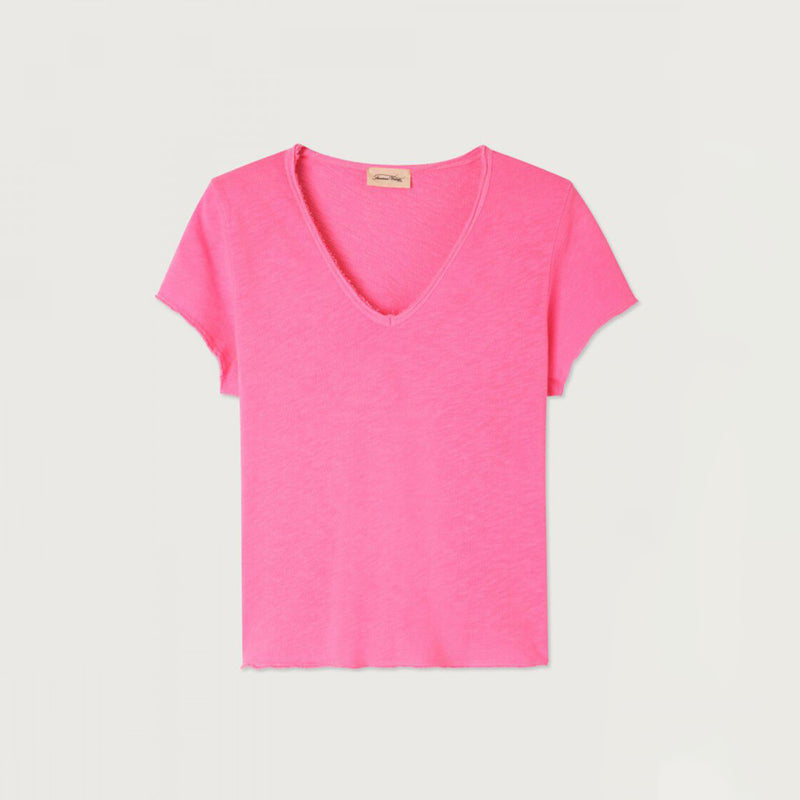 A bright pink short-sleeve V-neck t-shirt with a raw, frayed hem, displayed flat against a light off-white background.