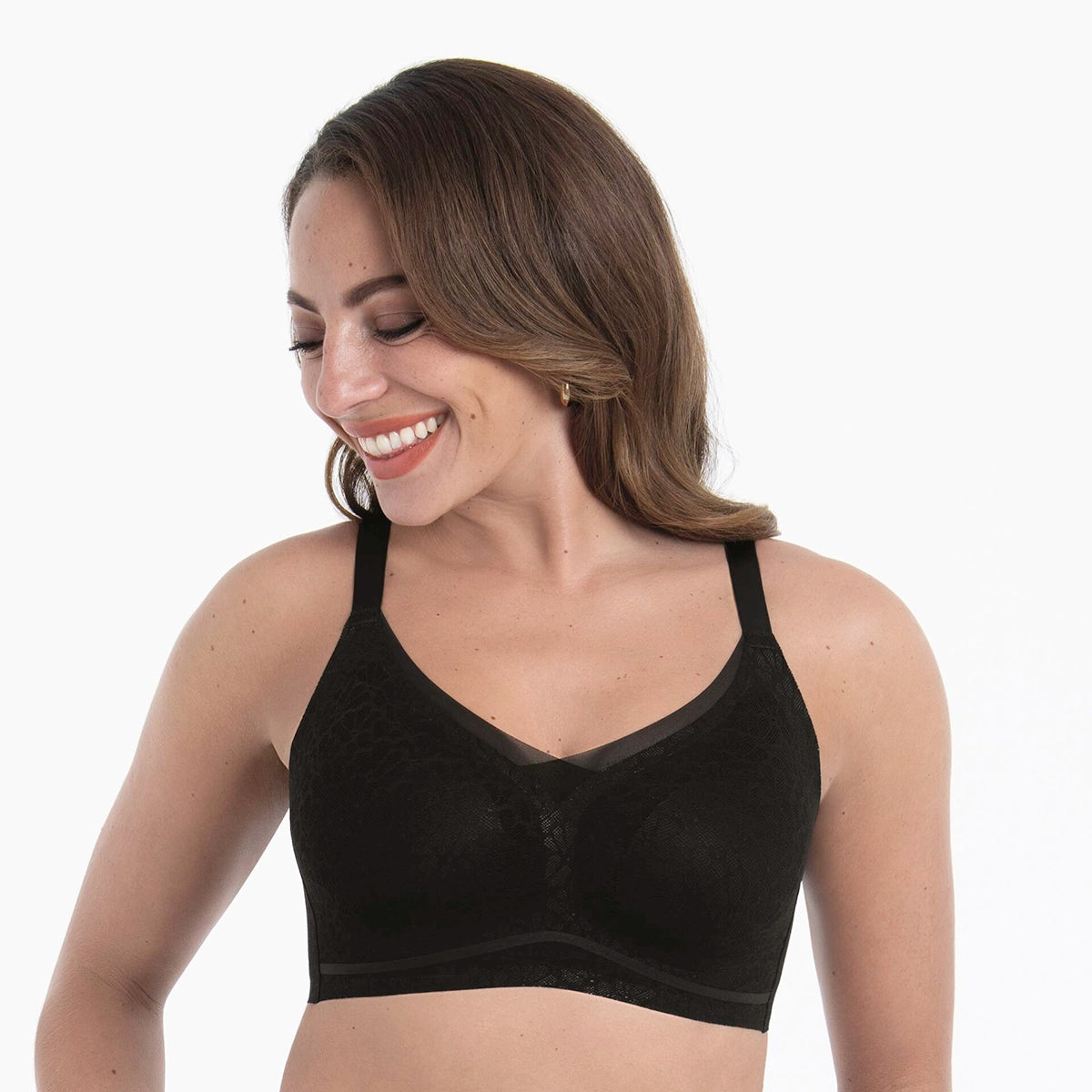 woman wearing a black bralette on a white background