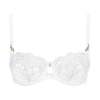White lace underwire bra with gold-tone decorative accents on the straps and center, shown against a plain white background.