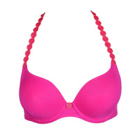 pink bra with decorative straps on a white background