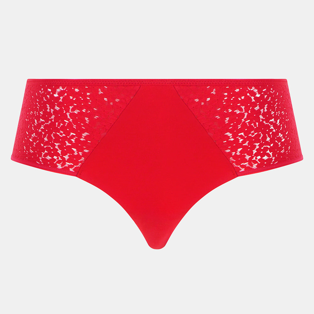 Red underwear with white speckled pattern on a light gray background