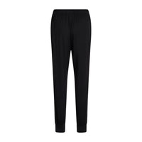 Black pyjama pants with an elastic waistband and drawstring, shown from behind, flat against a solid white background.