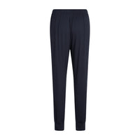 Dark blue pyjama pants with an elastic waistband and drawstring, shown from behind, flat against a solid white background.