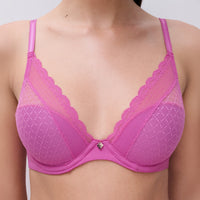 pink bra with lace details on a plain background