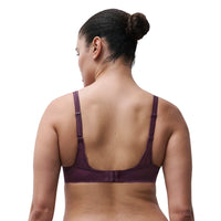 Rear view of a woman wearing a dark plum lace bra with adjustable straps, shown against a plain white background.