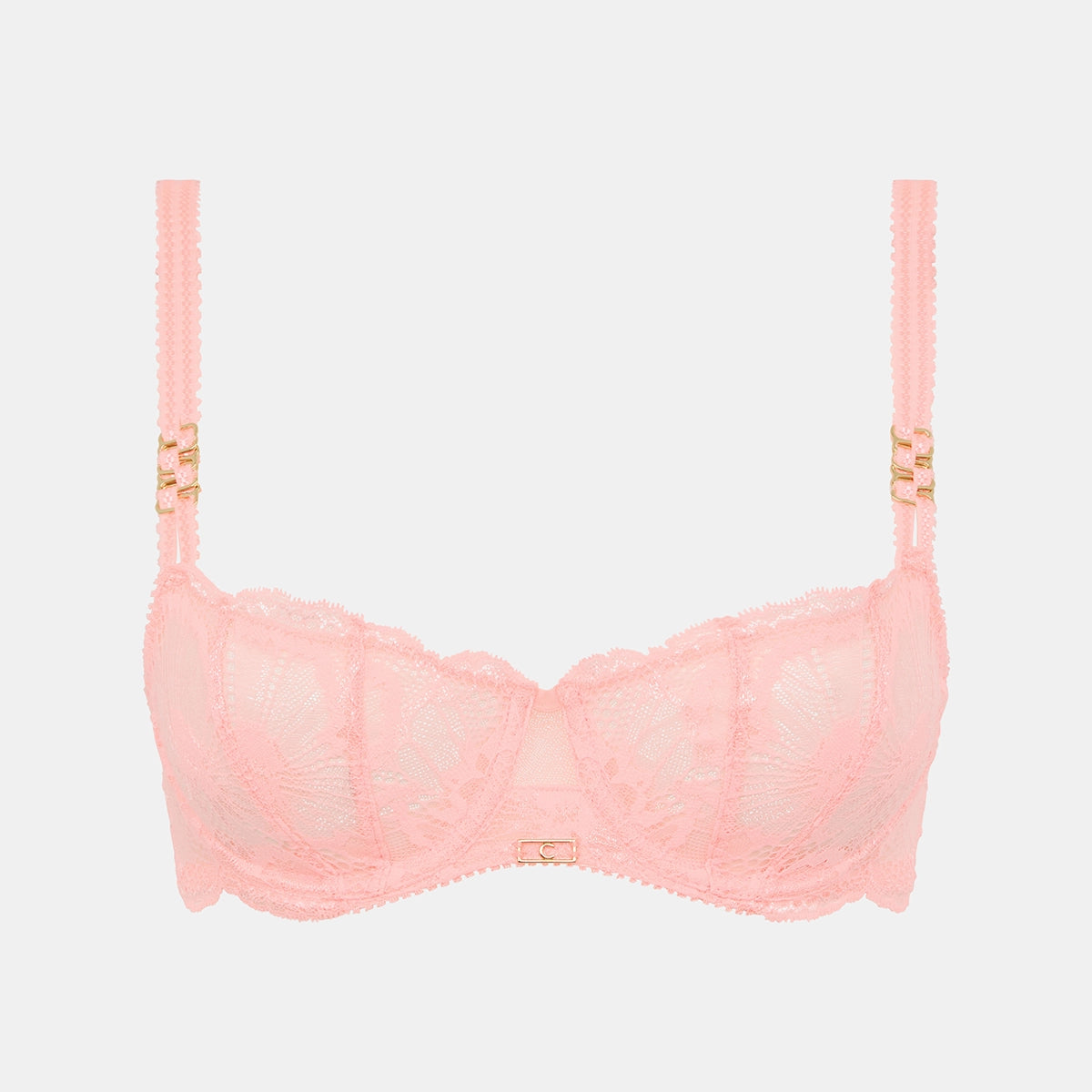 pink bra with gold straps on a light grey background