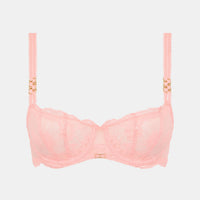 pink bra with gold straps on a light grey background