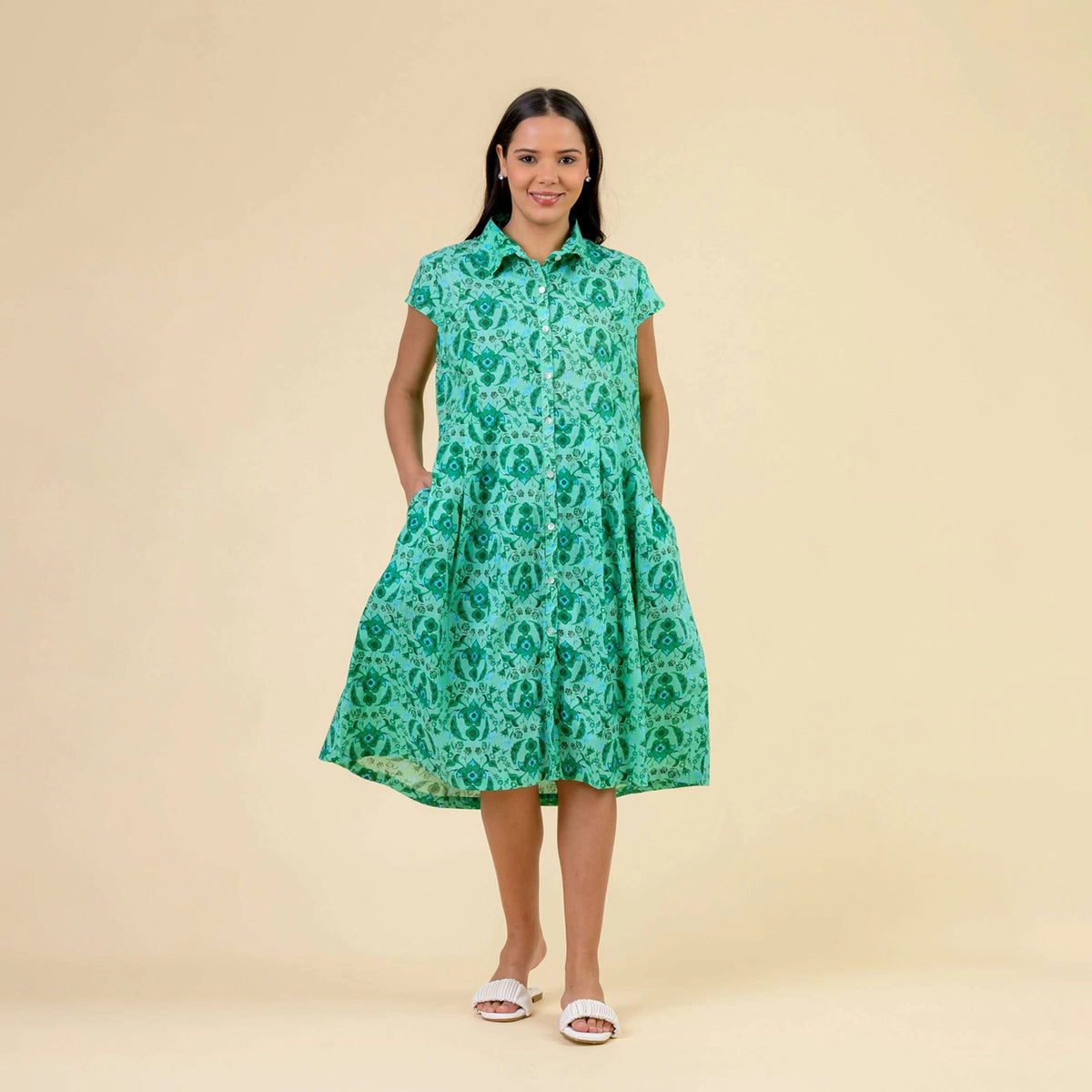 green knee lenght dress