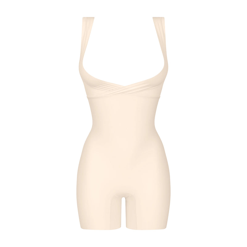 beige shapewear bodysuit on a white background
