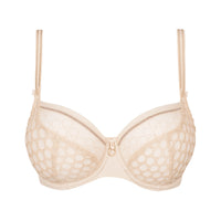 A beige underwire bra with a sheer floral lace pattern, featuring thin adjustable shoulder straps and a small gold ring closure at the center front, shown against a plain white background.