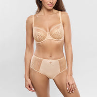 empreinte beige half cup bra and knicker set worn by a model