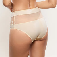 a close-up of a model wearing high-waisted sheer mesh briefs in a light cream or beige color, shown from the back against a plain light background.