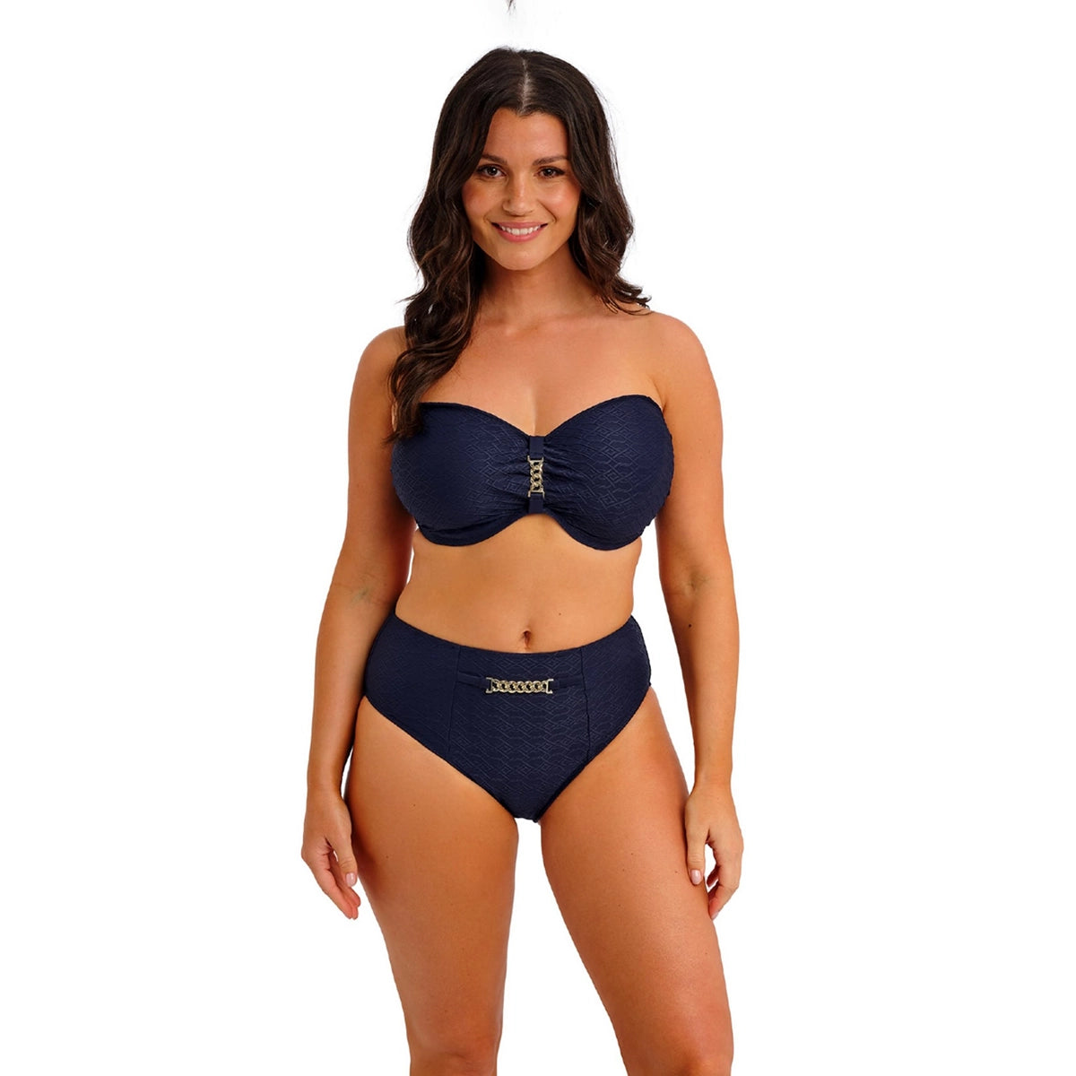 woman wearing a navy blue bikini with a white background