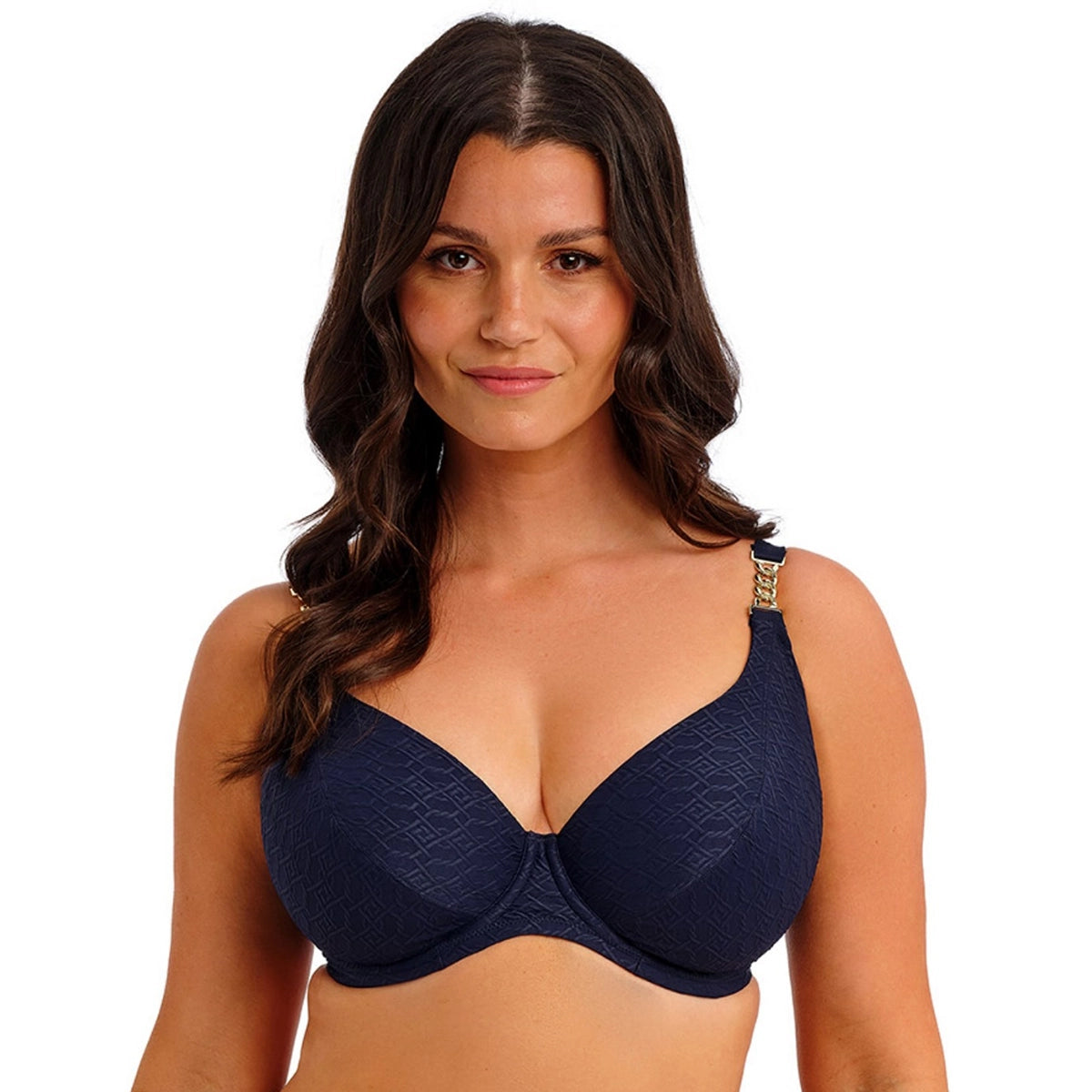 woman wearing a navy blue bikini top on a white background