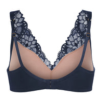 A women's wireless bra in navy blue with beige underwire cups and dark navy lace cups, shown against a plain white background.
