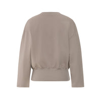 A taupe long-sleeve cropped sweatshirt shown from the back, featuring a relaxed fit and a gathered elastic waistband, set against a plain white background.