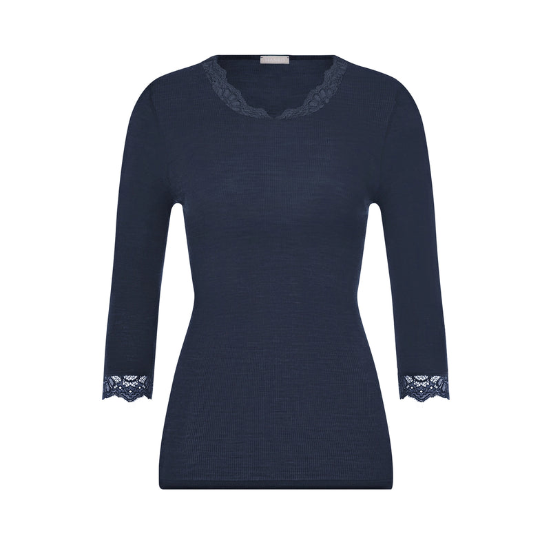 A navy blue long-sleeve knit top with delicate lace trim at the v-neck and cuffs, displayed on a clean white background.