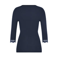 A navy blue long-sleeve top with a textured knit pattern and delicate lace trim at the cuffs, shown from the back on a white background.