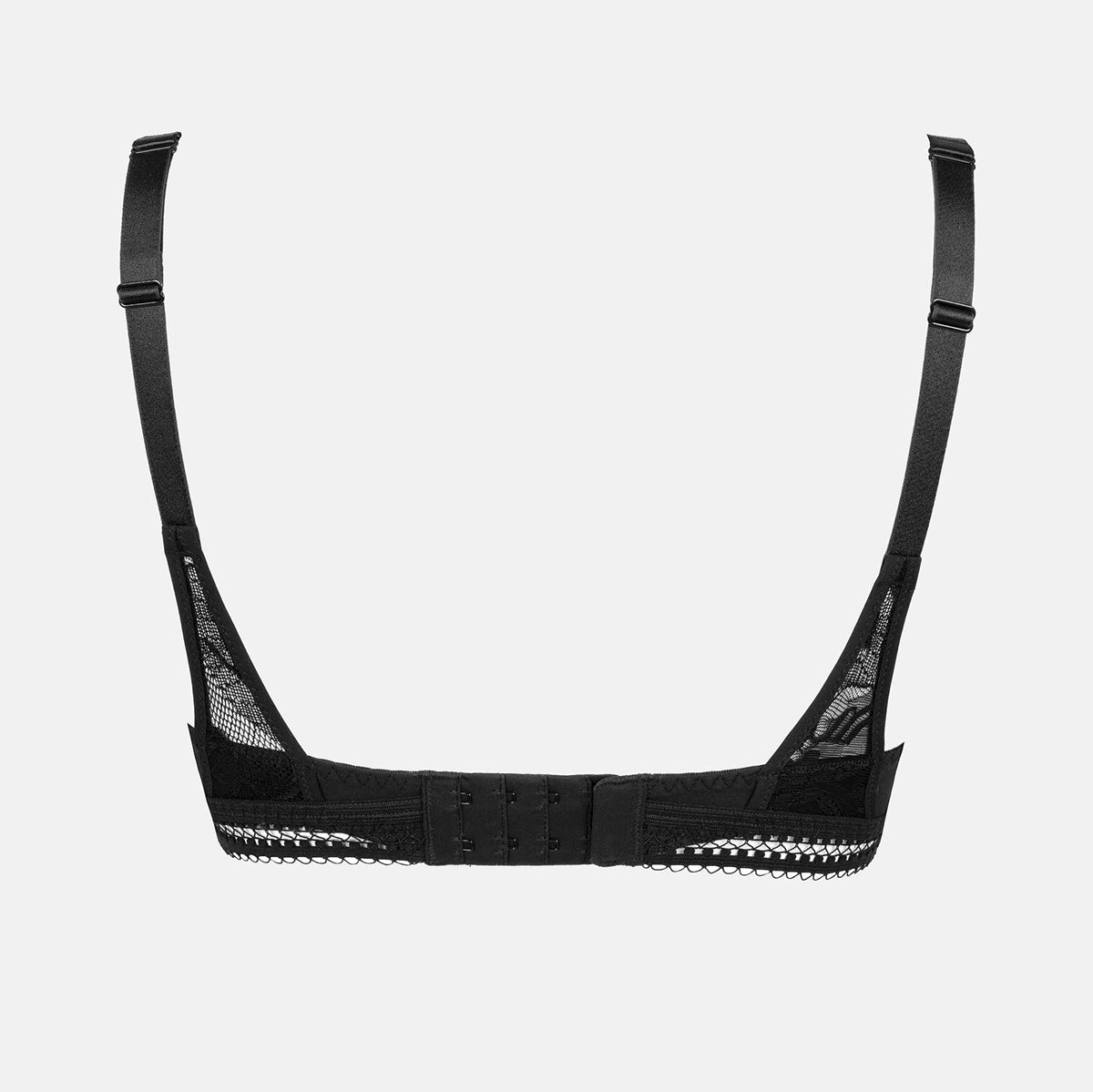 black bra with mesh details on a light gray background