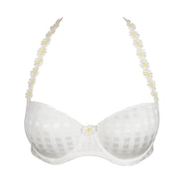white bra with floral straps on a white background