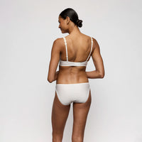 woman wearing marie jo bra and briefs in ivory colour
