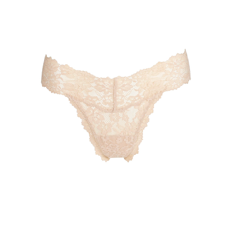 beige lace thong on a white background