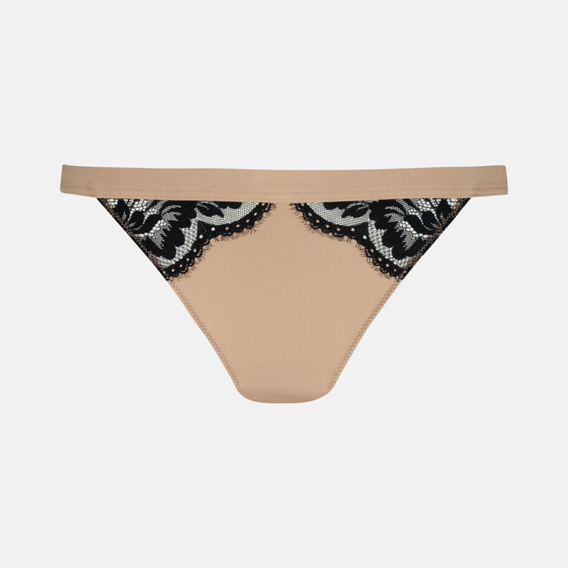 Beige thong underwear with black lace detailing along the front, displayed flat against a light gray background.