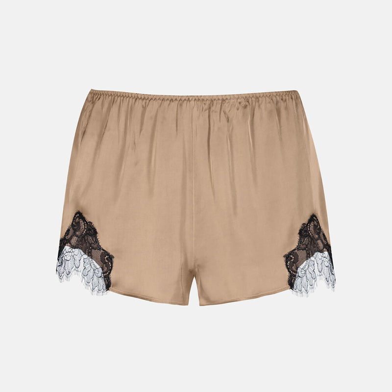 Beige satin shorts with black lace and white tulle trim at the hem, shown flat on a light gray background.