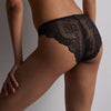 black lace underwear back on a neutral background