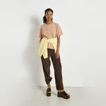 brown loose fit trousers