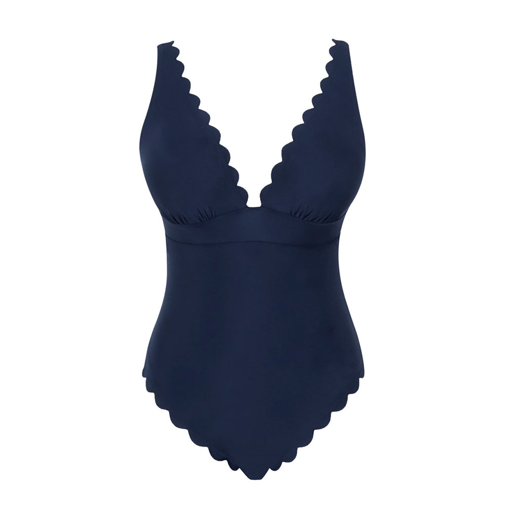 navy blue swimsuit with scalloped edges on a white background