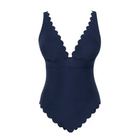 navy blue swimsuit with scalloped edges on a white background