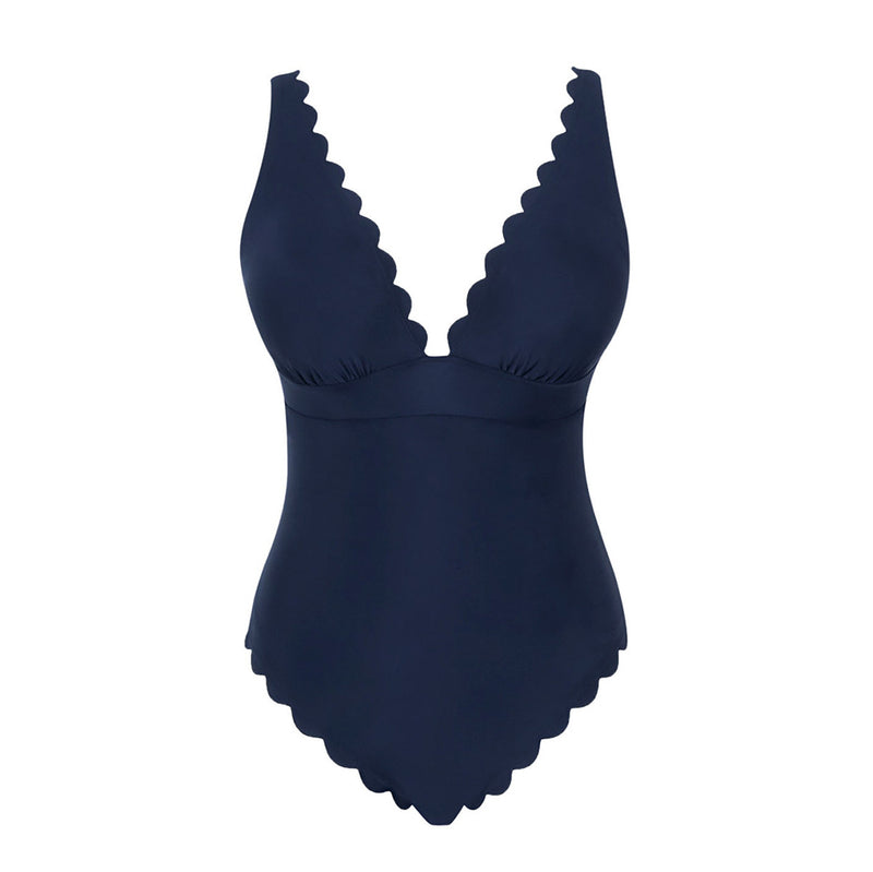 navy blue swimsuit with scalloped edges on a white background