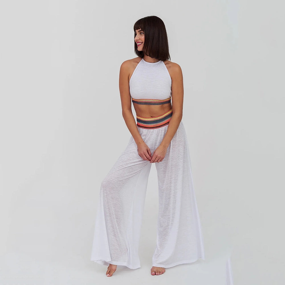 pitusa halter top and wide leg trousers on model in white
