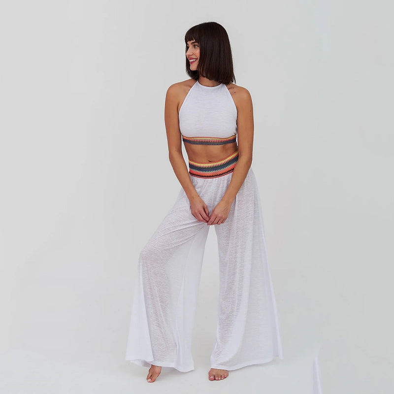 pitusa halter top and wide leg trousers on model in white