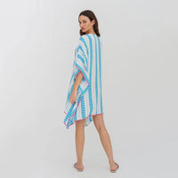 pitusa mini thobe in white with blue and pink detail on model