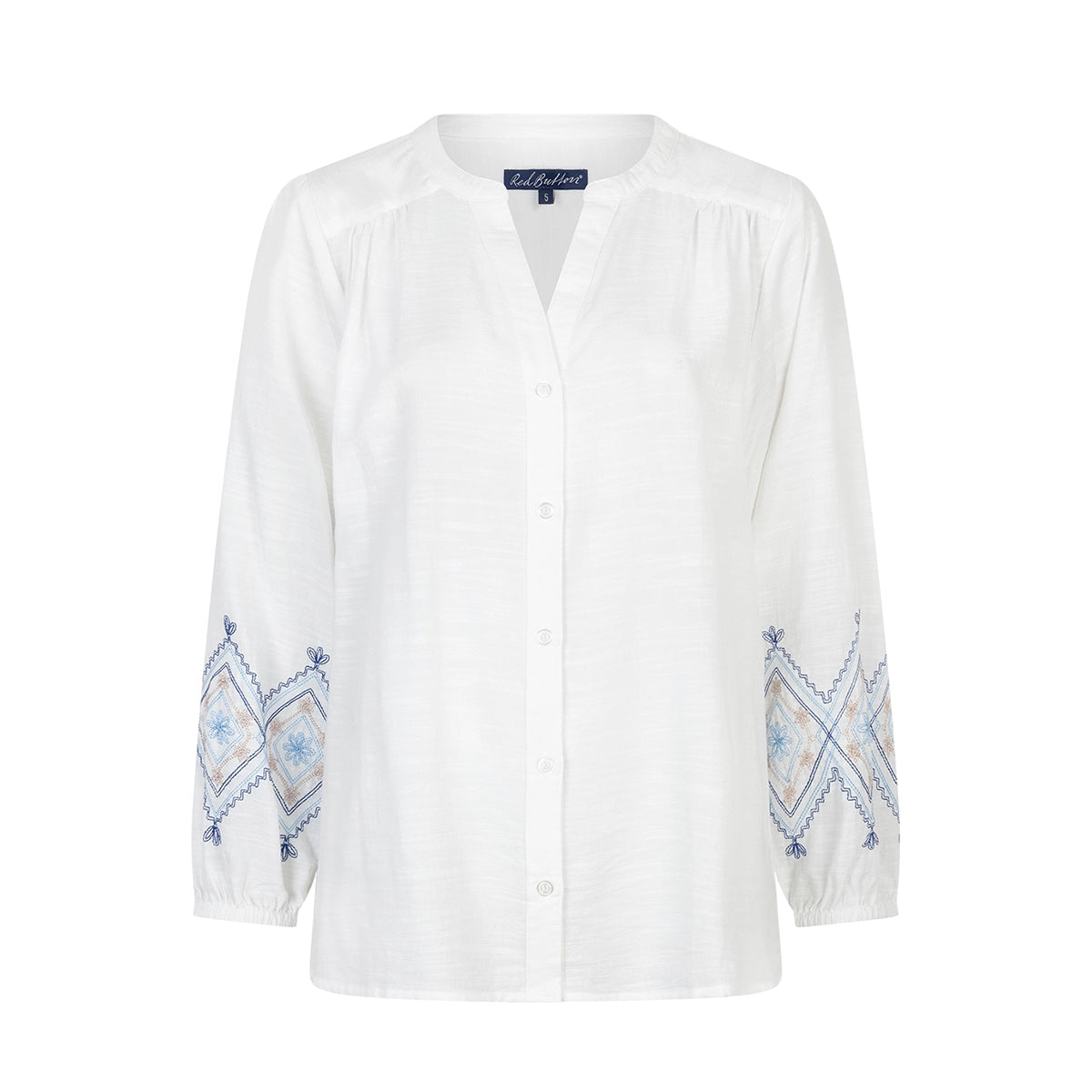 white blouse with embroidered sleeves on a white background