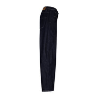 Dark indigo jeans shown from the side shown flat against a solid white background.