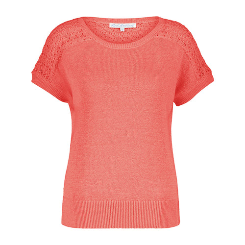 orange knitted top