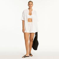 sea leave sunset aloha shirt paired with white bikini top and shorts