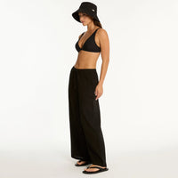 sea level sunset black beach pant on model