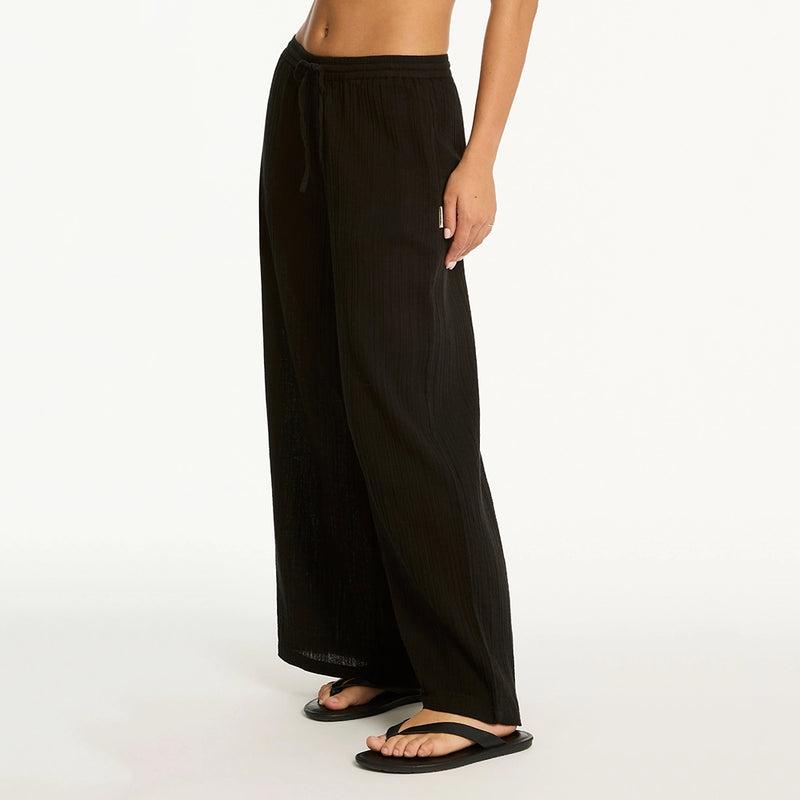 sea level sunset black beach pant close up