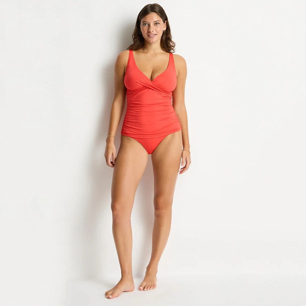 sea level cross front tankini top and bottom on model